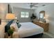 Bright bedroom features a ceiling fan and a large window that provide lots of natural light at 157 Garden Ln, Sarasota, FL 34242