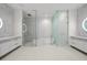 Spa-like bathroom with a large bathtub and shower at 1581 Gulf Of Mexico Dr # 508, Longboat Key, FL 34228