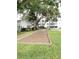 Community bocce ball court nestled among lush landscaping at 2228 Canal Dr # D26, Bradenton, FL 34207