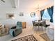 Bright dining area with table and chairs, and access to the living room at 2228 Canal Dr # D26, Bradenton, FL 34207