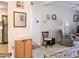 Living room features a comfy seating area, and view of the kitchen at 2228 Canal Dr # D26, Bradenton, FL 34207