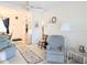 Spacious living room with comfy seating and a view to the dining area at 2228 Canal Dr # D26, Bradenton, FL 34207