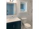 Clean bathroom featuring a vanity with quartz countertop at 2325 Ixora Ave, Sarasota, FL 34234