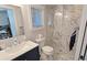 Elegant bathroom with marble shower, modern vanity, and window at 2325 Ixora Ave, Sarasota, FL 34234