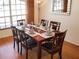 Formal dining room with a wood table and six chairs at 3405 Highland W Ave, Bradenton, FL 34205