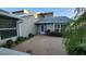 Front door entrance with small courtyard at 3409 Avenida Madera # A, Bradenton, FL 34210