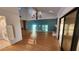 Open concept living room with a view into the kitchen at 3409 Avenida Madera # A, Bradenton, FL 34210