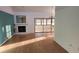 Bright living room with wood floors and fireplace at 3409 Avenida Madera # A, Bradenton, FL 34210