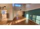 Vaulted ceilings and wood floors in the living room at 3409 Avenida Madera # A, Bradenton, FL 34210