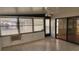 Sunroom with tile floors and access to the outdoors at 3409 Avenida Madera # A, Bradenton, FL 34210