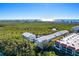Aerial view of community with ocean view at 3601 E Bay Dr # 203, Holmes Beach, FL 34217