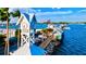 Pier and clock tower with surrounding waterfront area at 3601 E Bay Dr # 203, Holmes Beach, FL 34217