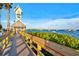 Scenic boardwalk with clock tower and ocean views at 3601 E Bay Dr # 203, Holmes Beach, FL 34217