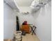Large walk-in closet with shelving and extra storage at 3601 E Bay Dr # 203, Holmes Beach, FL 34217