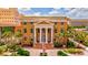 Historic Manatee County Courthouse, stately architecture, lush landscaping, American flag at 3601 E Bay Dr # 203, Holmes Beach, FL 34217
