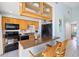 Well-equipped kitchen with wood cabinets and a breakfast bar at 3601 E Bay Dr # 203, Holmes Beach, FL 34217