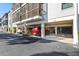 Covered parking spaces for residents with additional storage at 3601 E Bay Dr # 203, Holmes Beach, FL 34217