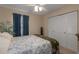 Bright bedroom with a queen bed and built-in closet at 3811 5Th W Ave, Palmetto, FL 34221