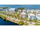 Aerial view showcasing the community's waterfront location and proximity to a marina at 396 Aruba Cir # 103, Bradenton, FL 34209