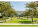 Attractive community courtyard with fountain and landscaping at 396 Aruba Cir # 103, Bradenton, FL 34209