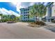 Exterior view of the building, highlighting its architectural style and landscaping at 396 Aruba Cir # 103, Bradenton, FL 34209