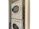Stackable washer and dryer in a convenient laundry closet at 396 Aruba Cir # 103, Bradenton, FL 34209