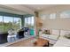 Open living space with water view and access to screened balcony at 396 Aruba Cir # 103, Bradenton, FL 34209