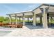 Relax and socialize at the outdoor bar with comfortable seating at 396 Aruba Cir # 103, Bradenton, FL 34209
