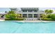 Cool off in this refreshing pool with a view of the clubhouse at 396 Aruba Cir # 103, Bradenton, FL 34209