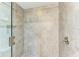 Clean shower with glass enclosure and neutral-toned tile at 396 Aruba Cir # 103, Bradenton, FL 34209