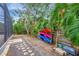 Kayaks stored near the pool and screened patio area at 421 Island Cir, Sarasota, FL 34242