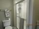 Clean bathroom with a shower and toilet at 4470 Weybridge # 68, Sarasota, FL 34235