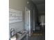 Bright and welcoming entryway with decorative accents at 4470 Weybridge # 68, Sarasota, FL 34235