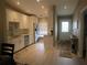 Updated kitchen featuring white cabinets and stainless steel appliances at 4470 Weybridge # 68, Sarasota, FL 34235