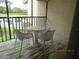 Enjoy the view from this lanai with seating for four at 4470 Weybridge # 68, Sarasota, FL 34235