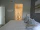 Main bedroom with view into the en-suite bathroom at 4470 Weybridge # 68, Sarasota, FL 34235