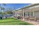 Enjoy the covered patio and pool view at 5165 Sandy Cove Ave, Siesta Key, FL 34242