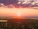 Stunning sunset over a coastal town, aerial view at 5218 6Th Avenue W Dr, Bradenton, FL 34209