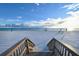 Steps leading to pristine sandy beach at 535 Sanctuary Dr # C408, Longboat Key, FL 34228