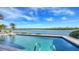 Inviting swimming pool with tranquil waterway views at 5412 Siesta Cove Dr, Sarasota, FL 34242