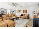 Bright living room with a cozy atmosphere and partial kitchen view at 6138 Colmar Pl, Apollo Beach, FL 33572