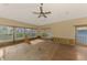 Large living room with hardwood floors and ample natural light at 713 Eagle Point Dr, Venice, FL 34285