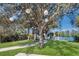 Romantic lakeside pergola with hanging paper lanterns at 9415 Discovery Ter # 101, Bradenton, FL 34212