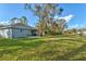 Large grassy backyard, great for outdoor activities at 10459 Myakka Blvd, Myakka City, FL 34251