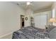 Guest bedroom with ceiling fan, double closet and en-suite bathroom at 11120 Sanctuary Dr, Bradenton, FL 34209