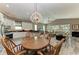 Kitchen with an adjacent dining area and breakfast bar at 11120 Sanctuary Dr, Bradenton, FL 34209