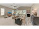 Spacious living room with vaulted ceilings and views to the lanai at 11120 Sanctuary Dr, Bradenton, FL 34209