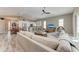 Open concept living room and kitchen with tile floors at 11120 Sanctuary Dr, Bradenton, FL 34209