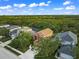 An aerial view showcasing a house's location within a residential community at 11606 Water Poppy Ter, Lakewood Ranch, FL 34202