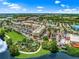 Aerial view of shopping center and lakefront at 11606 Water Poppy Ter, Lakewood Ranch, FL 34202